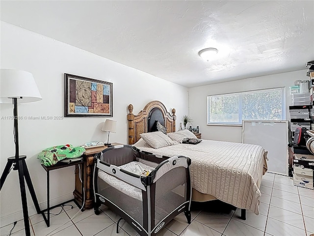 bedroom featuring a textured ceiling