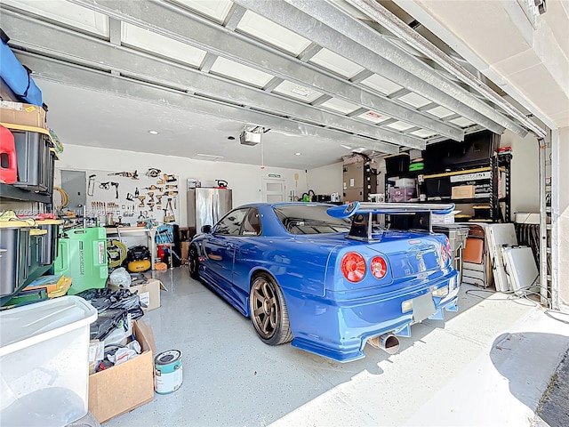 garage featuring a garage door opener