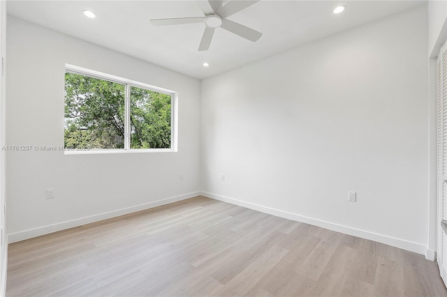 unfurnished room with light wood-style flooring, recessed lighting, a ceiling fan, and baseboards