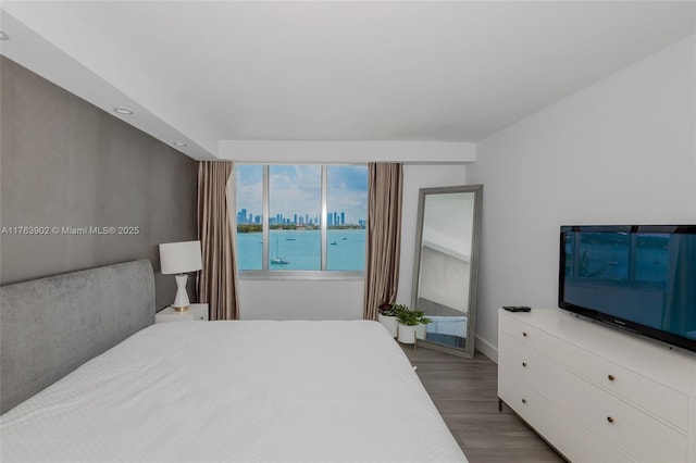 bedroom featuring wood finished floors