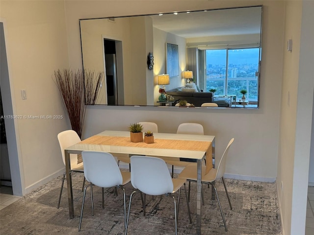 2451 Brickell Ave Unit 20N, Miami, FL 33129 - dining area featuring baseboards