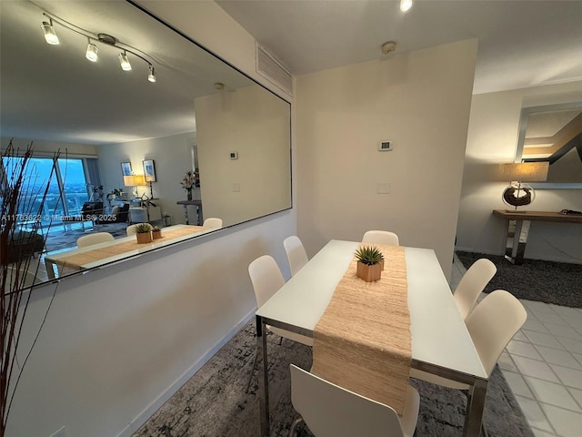 2451 Brickell Ave Unit 20N, Miami, FL 33129 - dining space with baseboards