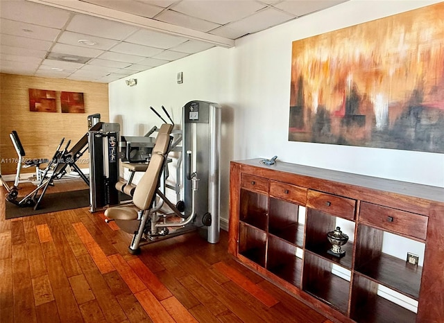 2451 Brickell Ave Unit 20N, Miami, FL 33129 - workout room featuring a drop ceiling and dark wood finished floors