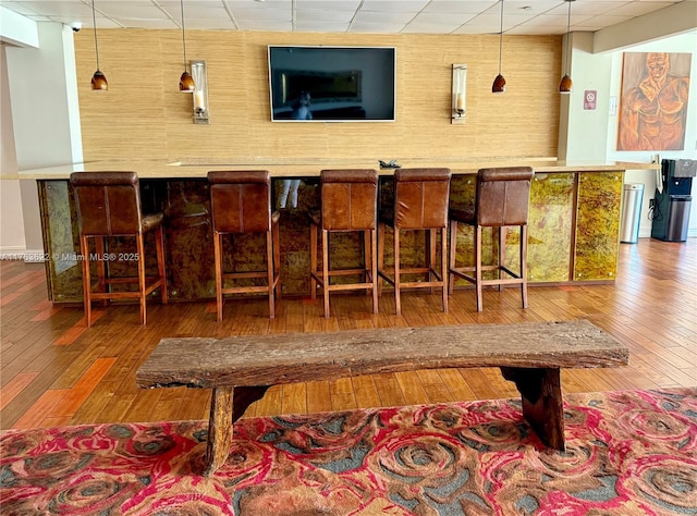 2451 Brickell Ave Unit 20N, Miami, FL 33129 - bar with a paneled ceiling and hardwood / wood-style floors