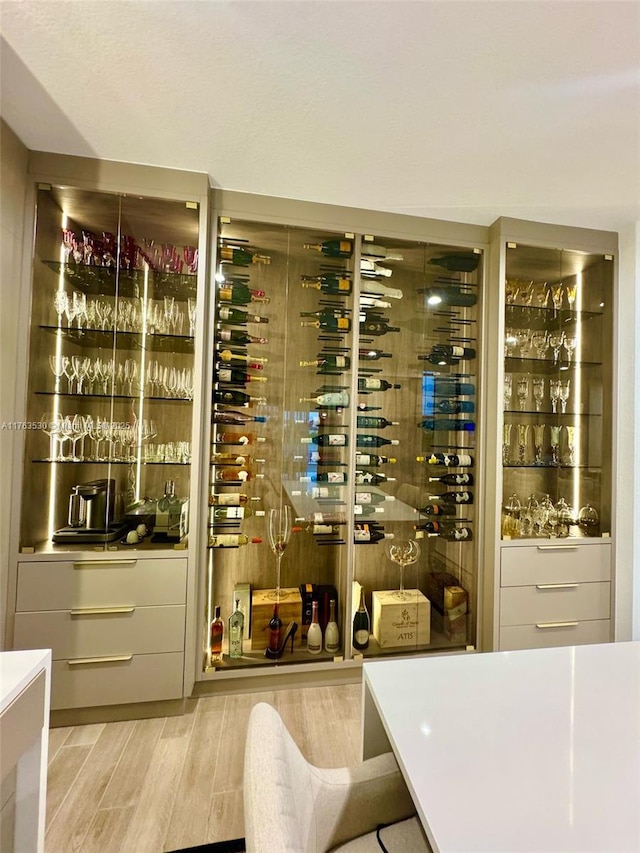 wine area featuring light wood finished floors