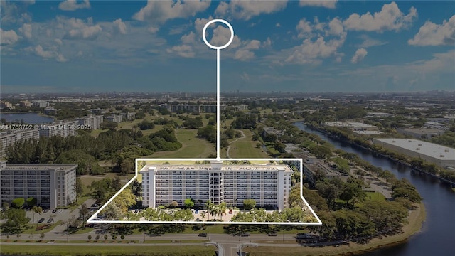 aerial view featuring a water view and a city view