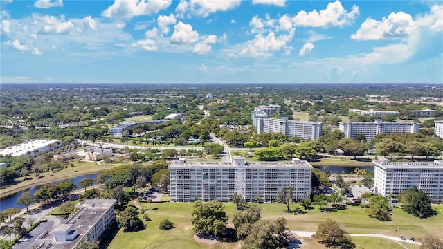 bird's eye view with a city view and a water view