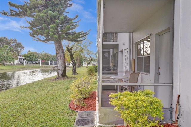 view of yard with a water view