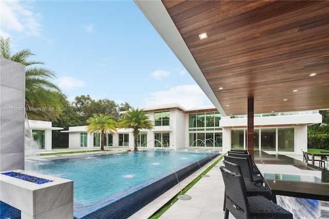 pool with a patio area