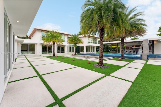 pool with a patio area