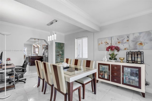 dining room featuring a chandelier, marble finish floor, arched walkways, and crown molding