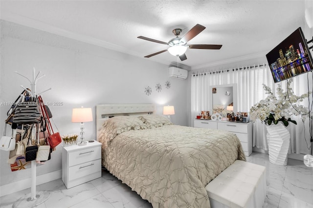 bedroom featuring an AC wall unit, crown molding, marble finish floor, and a textured ceiling