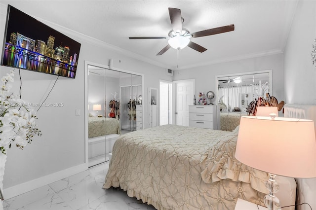 bedroom featuring a closet, baseboards, marble finish floor, and ornamental molding