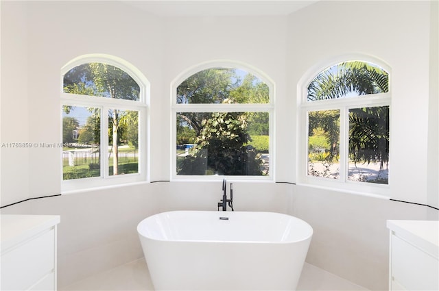 full bathroom with a soaking tub