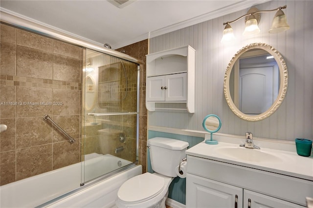 full bath with vanity, toilet, and enclosed tub / shower combo