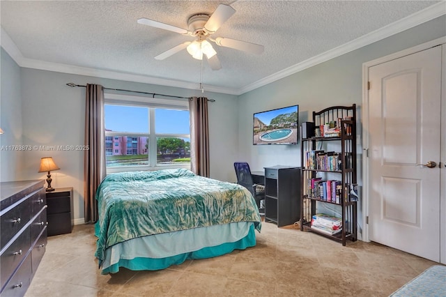 bedroom featuring a textured ceiling, a ceiling fan, and ornamental molding