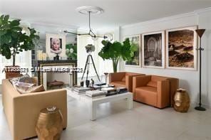 living room with ornamental molding