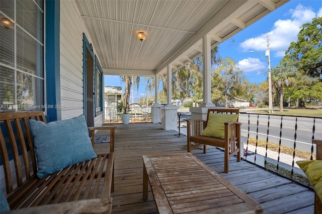 wooden terrace with covered porch