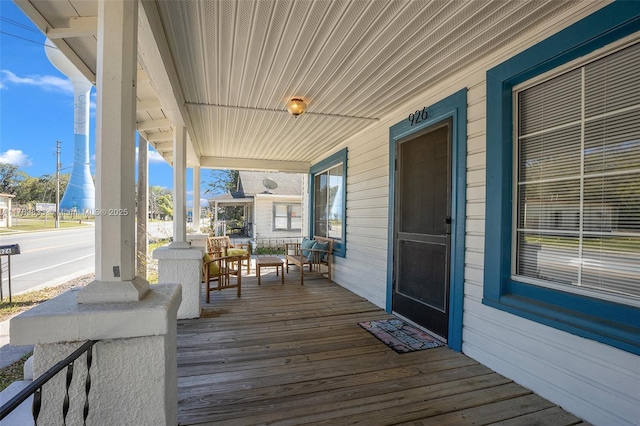 wooden deck featuring a porch