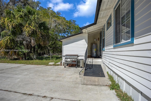 view of patio / terrace featuring water heater