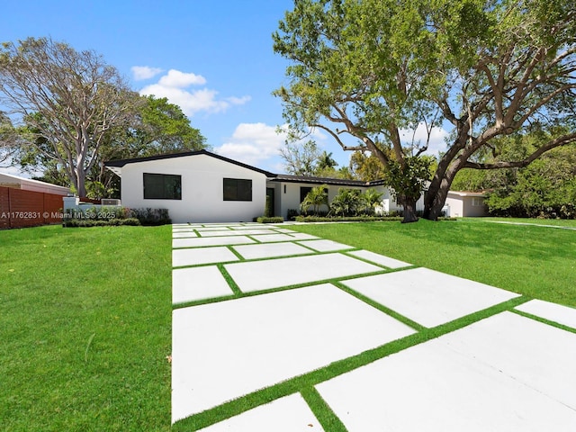 exterior space featuring a lawn