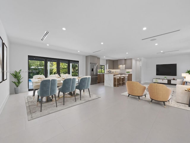 dining space featuring visible vents, recessed lighting, and baseboards