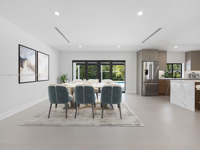 dining area featuring recessed lighting, visible vents, and baseboards