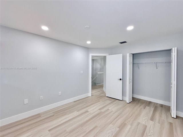 unfurnished bedroom with recessed lighting, baseboards, visible vents, and light wood finished floors