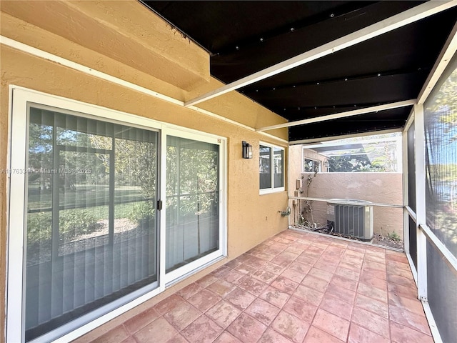 unfurnished sunroom with plenty of natural light