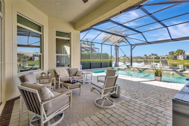 view of patio with an outdoor living space, an outdoor pool, and glass enclosure