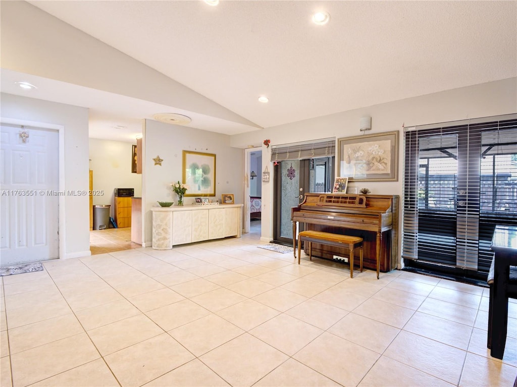 6240 NW 176th Ter, Hialeah, FL 33015 - interior space featuring lofted ceiling, recessed lighting, and light tile patterned floors
