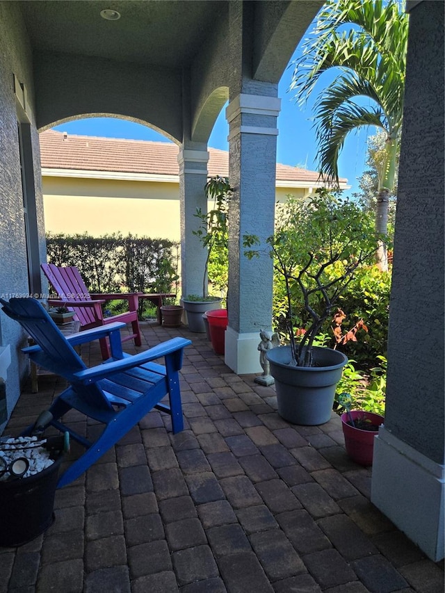 view of patio terrace at dusk