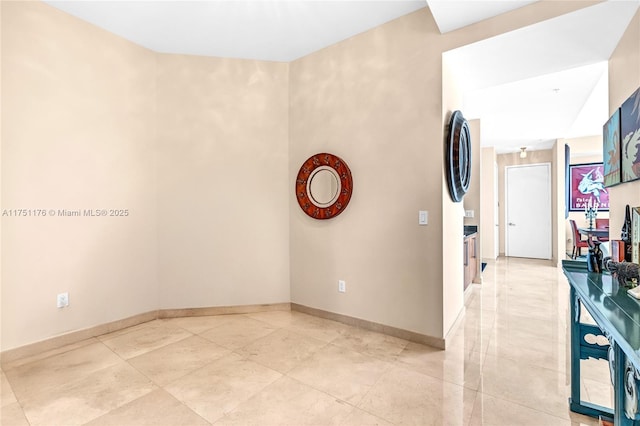 interior space with baseboards