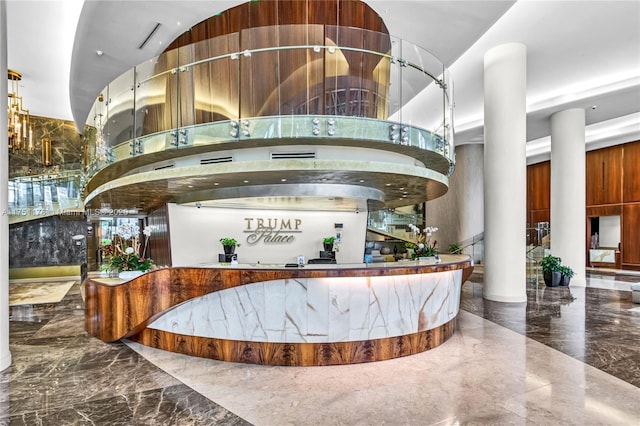 reception area featuring a community bar