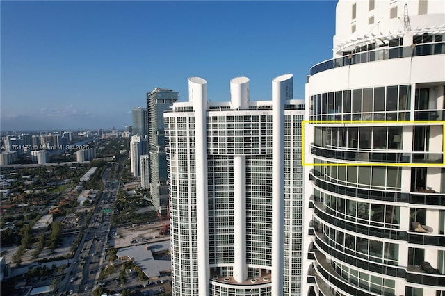 view of building exterior featuring a view of city