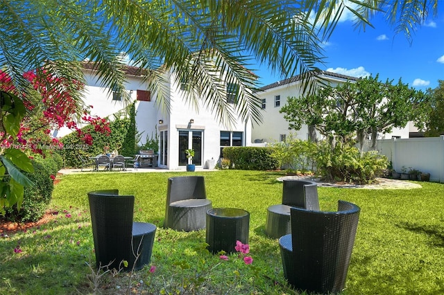 view of yard featuring a patio and fence