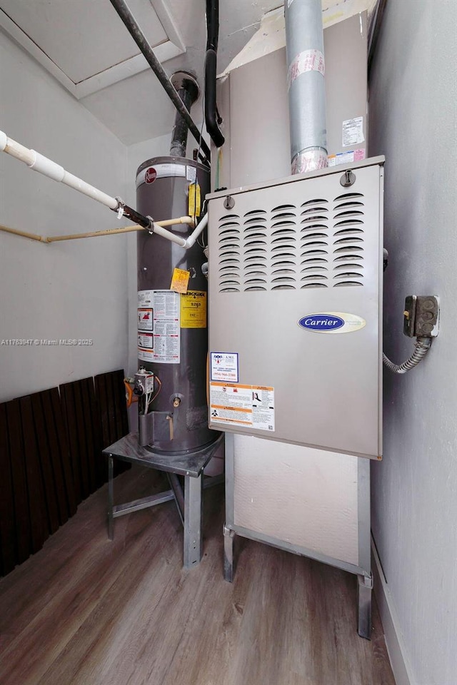 utility room with water heater