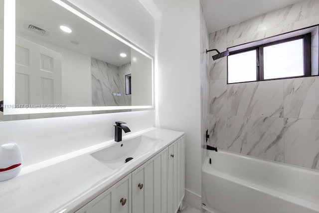 full bath with visible vents, recessed lighting, tub / shower combination, and vanity