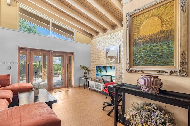 office area with beam ceiling, high vaulted ceiling, wood finished floors, french doors, and wooden ceiling