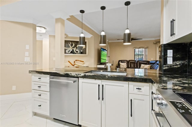 kitchen with marble finish floor, white cabinetry, stainless steel appliances, and ornamental molding