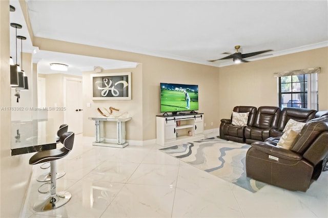 living room with marble finish floor, baseboards, ceiling fan, and ornamental molding