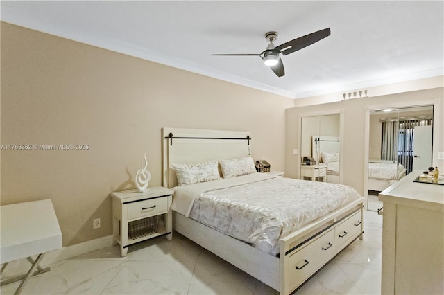 bedroom featuring a ceiling fan, baseboards, marble finish floor, and ornamental molding