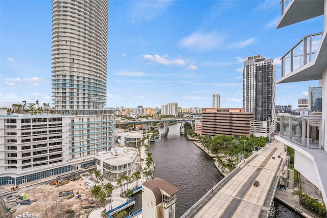 property's view of city featuring a water view
