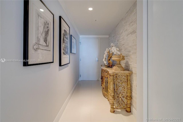 hall with crown molding, light tile patterned floors, recessed lighting, and baseboards