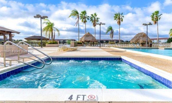 pool featuring a patio area