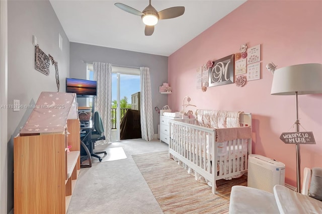 carpeted bedroom featuring access to exterior