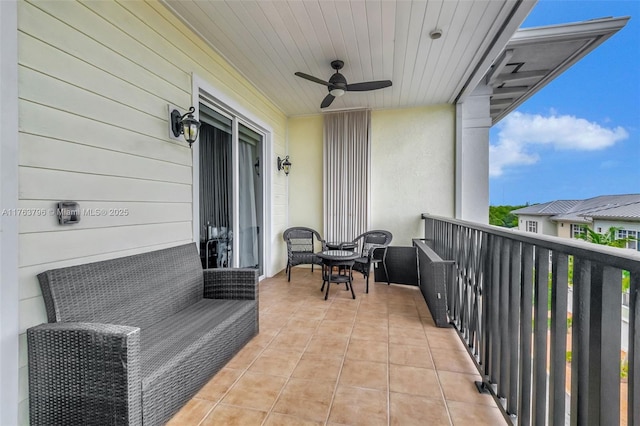 balcony featuring a ceiling fan