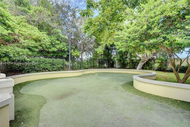 surrounding community featuring fence