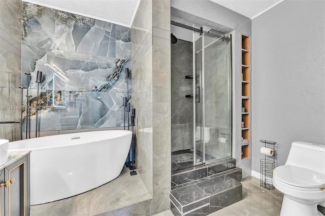 bathroom with a freestanding tub, toilet, marble finish floor, and a stall shower