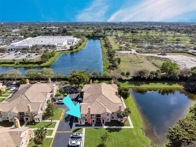 aerial view with a residential view and a water view